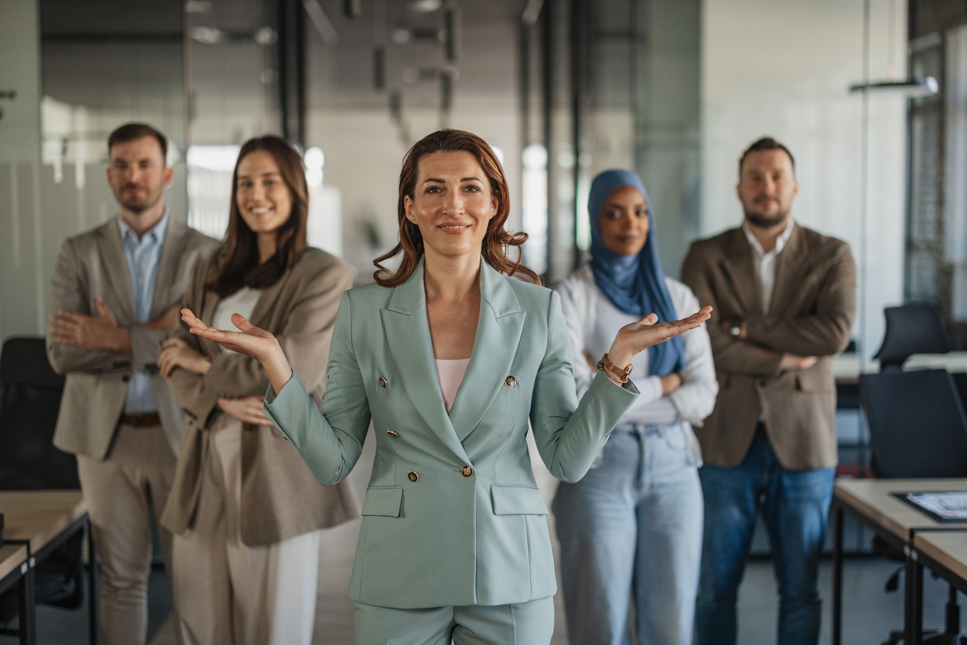Confident Team Leader in Front of Colleagues